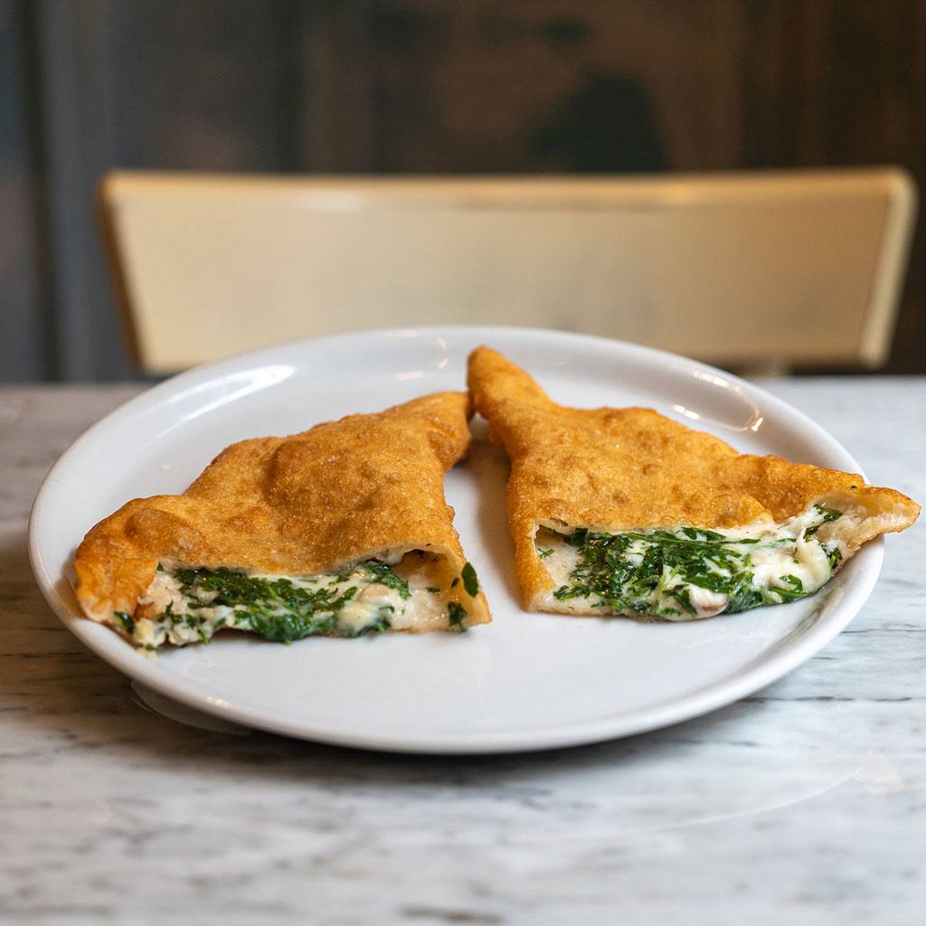 Posillipo – Rucola, scorzetta di limone, caciocavallo, provola e basilico
